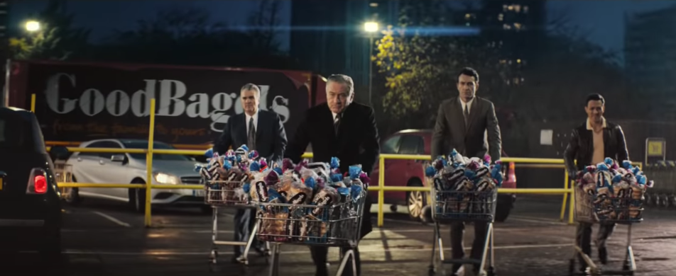De Niro with bagels in a trolley